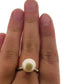 Full view of Organic Pearl Ring on woman's finger to help give an idea of its scale.
